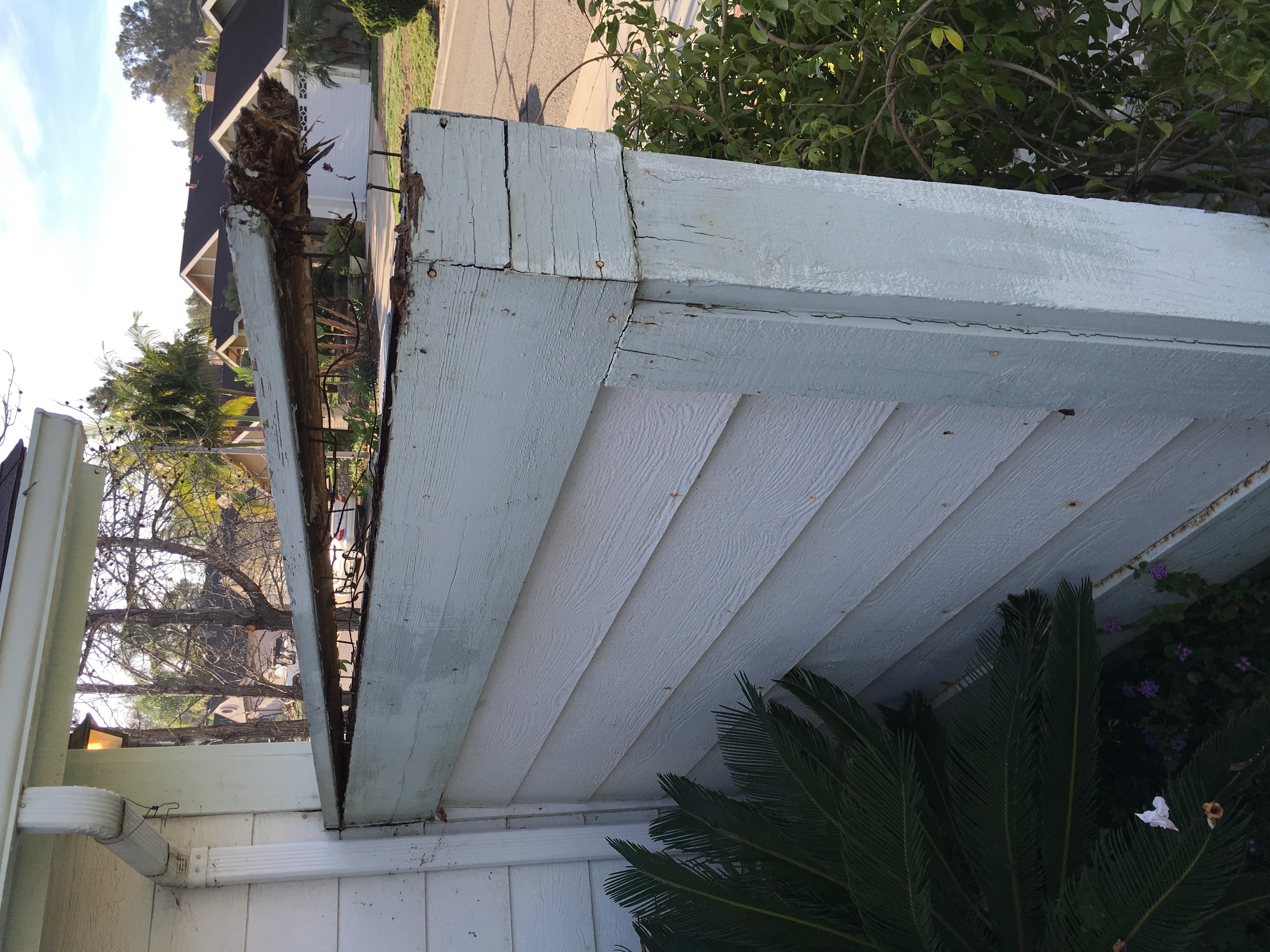 Damaged stucco exterior wall before restoration